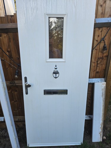 Composite door and frame with - and,